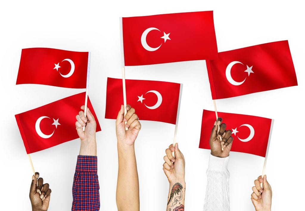 hands waving flags turkey Yabancı Uyruklulara Türkçe Öğretimi B1